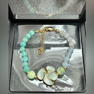 Gold and Green Beaded Bracelet with Floral Accent